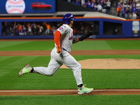 Francisco Alvarez #4 of the New York Mets scores during the third inning in Game 5 of the baseball NL Championship Series against the Los An...