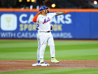 New York Mets player Francisco Alvarez #4 gestures after doubling during the second inning in Game 5 of the baseball NL Championship Series...