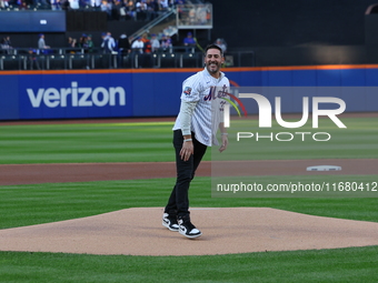 2015 NLCS Champion Matt Harvey throws out the ceremonial first pitch before Game 5 of a baseball NL Division Series between the Los Angeles...