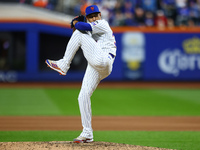 New York Mets relief pitcher Edwin Diaz #39 throws during the eighth inning in Game 5 of the baseball NL Championship Series against the Los...