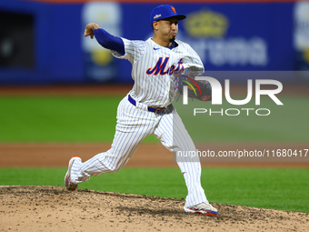 New York Mets relief pitcher Edwin Diaz #39 throws during the eighth inning in Game 5 of the baseball NL Championship Series against the Los...