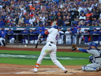 New York Mets' Starling Marte #6 doubles during the first inning in Game 5 of the baseball NL Championship Series against the Los Angeles Do...