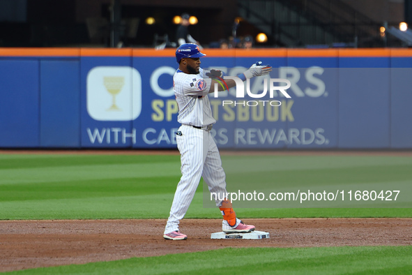 New York Mets' Starling Marte #6 doubles during the first inning in Game 5 of the baseball NL Championship Series against the Los Angeles Do...