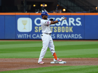 New York Mets' Starling Marte #6 doubles during the first inning in Game 5 of the baseball NL Championship Series against the Los Angeles Do...