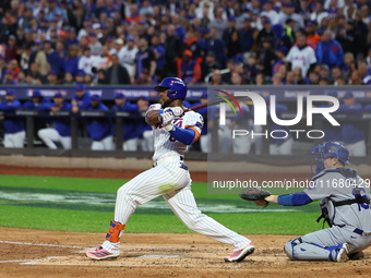 New York Mets' Starling Marte #6 doubles during the third inning in Game 5 of the baseball NL Championship Series against the Los Angeles Do...