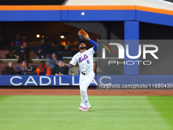 New York Mets right fielder Starling Marte #6 makes a catch during the third inning in Game 5 of the baseball NL Championship Series against...