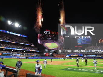 The New York Mets celebrate with fireworks after the team's 12-6 victory in Game 5 of the baseball NL Championship Series against the Los An...