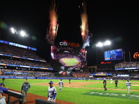 The New York Mets celebrate with fireworks after the team's 12-6 victory in Game 5 of the baseball NL Championship Series against the Los An...