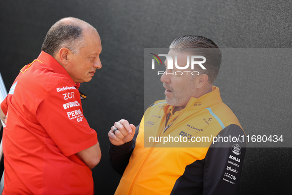 Frederic Vasseur and Zak Brown have a conversation next to the Ferrari hospitality suite at Circuit of the Americas in Austin, Texas, on Oct...