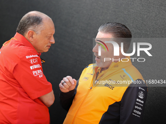 Frederic Vasseur and Zak Brown have a conversation next to the Ferrari hospitality suite at Circuit of the Americas in Austin, Texas, on Oct...