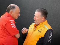 Frederic Vasseur and Zak Brown have a conversation next to the Ferrari hospitality suite at Circuit of the Americas in Austin, Texas, on Oct...