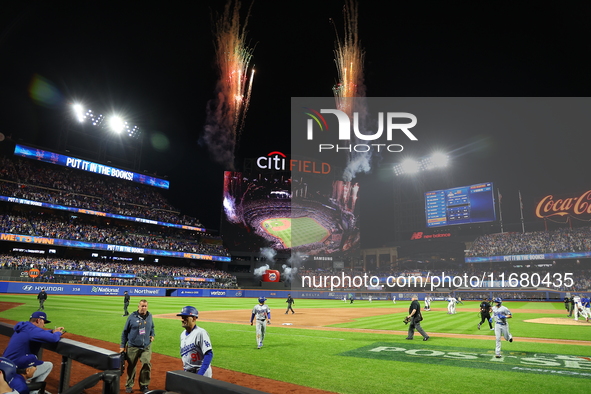 The New York Mets celebrate with fireworks after the team's 12-6 victory in Game 5 of the baseball NL Championship Series against the Los An...