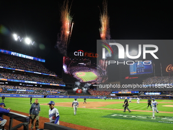 The New York Mets celebrate with fireworks after the team's 12-6 victory in Game 5 of the baseball NL Championship Series against the Los An...