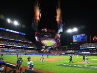 The New York Mets celebrate with fireworks after the team's 12-6 victory in Game 5 of the baseball NL Championship Series against the Los An...