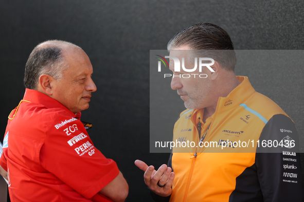 Frederic Vasseur and Zak Brown have a conversation next to the Ferrari hospitality suite at Circuit of the Americas in Austin, Texas, on Oct...