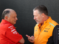 Frederic Vasseur and Zak Brown have a conversation next to the Ferrari hospitality suite at Circuit of the Americas in Austin, Texas, on Oct...