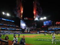 The New York Mets celebrate with fireworks after the team's 12-6 victory in Game 5 of the baseball NL Championship Series against the Los An...