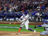 Brandon Nimmo #9 of the New York Mets singles during the third inning in Game 5 of the baseball NL Championship Series against the Los Angel...