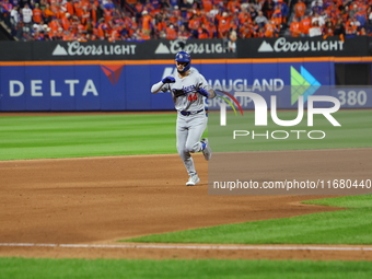 Los Angeles Dodgers player Andy Pages #44 rounds the bases after homering during the fifth inning in Game 5 of the baseball NL Championship...