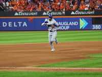 Los Angeles Dodgers player Andy Pages #44 rounds the bases after homering during the fifth inning in Game 5 of the baseball NL Championship...