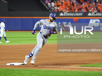 Los Angeles Dodgers player Andy Pages #44 rounds the bases after homering during the fifth inning in Game 5 of the baseball NL Championship...