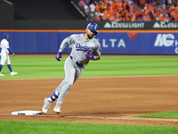 Los Angeles Dodgers player Andy Pages #44 rounds the bases after homering during the fifth inning in Game 5 of the baseball NL Championship...