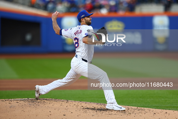 New York Mets starting pitcher David Peterson #23 throws during the first inning in Game 5 of the baseball NL Championship Series against th...