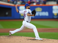 New York Mets starting pitcher David Peterson #23 throws during the first inning in Game 5 of the baseball NL Championship Series against th...