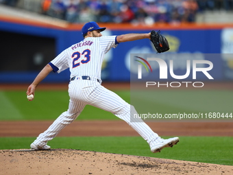 New York Mets starting pitcher David Peterson #23 throws during the first inning in Game 5 of the baseball NL Championship Series against th...