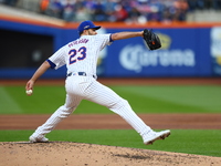 New York Mets starting pitcher David Peterson #23 throws during the first inning in Game 5 of the baseball NL Championship Series against th...