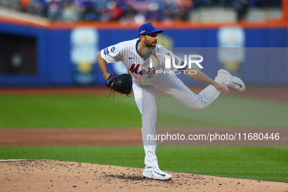 New York Mets starting pitcher David Peterson #23 throws during the first inning in Game 5 of the baseball NL Championship Series against th...