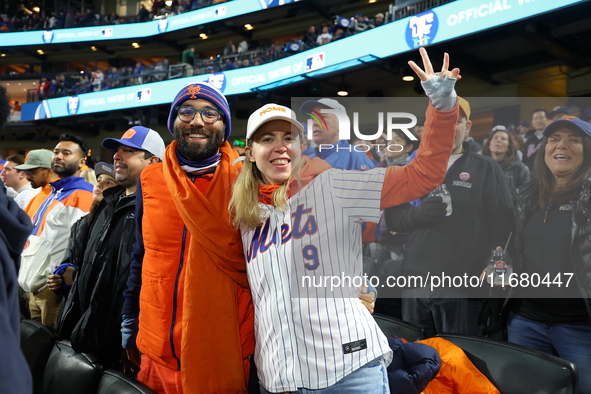 New York Mets fans sing ''Take Me Out to the Ball Game'' during the seventh inning stretch of the baseball game between the Los Angeles Dodg...