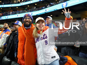 New York Mets fans sing ''Take Me Out to the Ball Game'' during the seventh inning stretch of the baseball game between the Los Angeles Dodg...