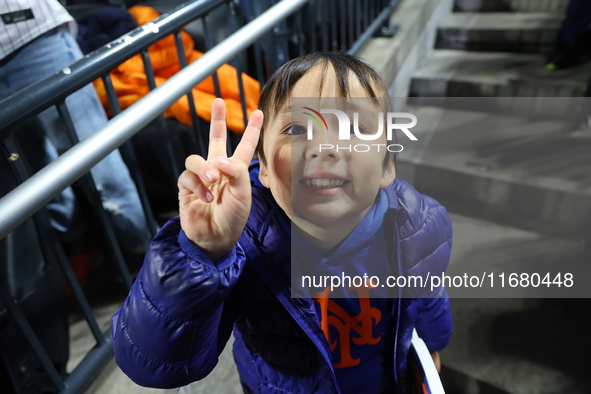 New York Mets fans sing ''Take Me Out to the Ball Game'' during the seventh inning stretch of the baseball game between the Los Angeles Dodg...