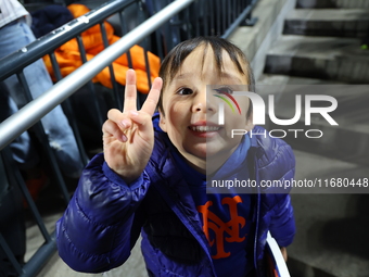 New York Mets fans sing ''Take Me Out to the Ball Game'' during the seventh inning stretch of the baseball game between the Los Angeles Dodg...