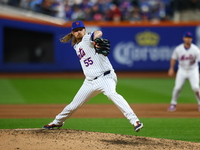 New York Mets relief pitcher Ryne Stanek #55 throws during the sixth inning in Game 5 of the baseball NL Championship Series against the Los...