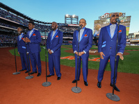 The Temptations sing the National Anthem on the field before Game 5 of a baseball NL Championship Series between the Los Angeles Dodgers and...