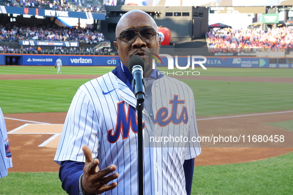 The Temptations sing the National Anthem on the field before Game 5 of a baseball NL Championship Series between the Los Angeles Dodgers and...