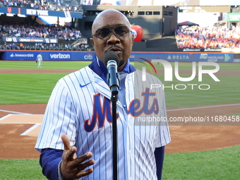 The Temptations sing the National Anthem on the field before Game 5 of a baseball NL Championship Series between the Los Angeles Dodgers and...