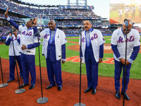 The Temptations sing the National Anthem on the field before Game 5 of a baseball NL Championship Series between the Los Angeles Dodgers and...