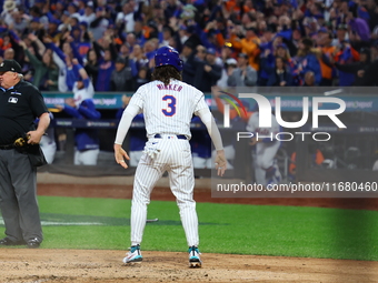 Jesse Winker #3 of the New York Mets scores during the LOREM inning in Game 5 of the baseball NL Championship Series against the Los Angeles...