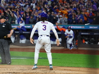 Jesse Winker #3 of the New York Mets scores during the LOREM inning in Game 5 of the baseball NL Championship Series against the Los Angeles...