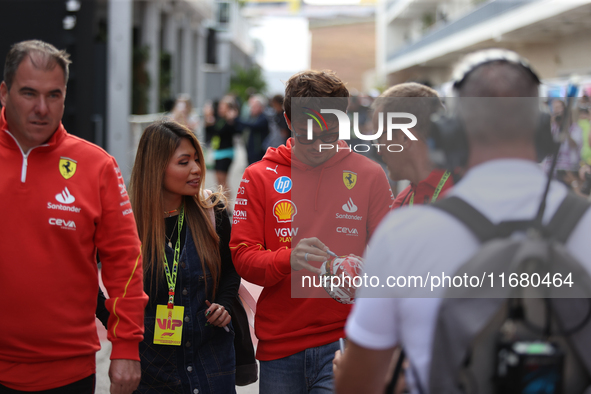 Charles Leclerc signs merchandise for his fans in the paddock at Circuit of the Americas in Austin, Texas, on October 18, 2024, during the F...