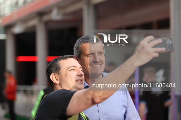 Guenther Steiner takes a photo with a fan at Circuit of the Americas in Austin, Texas, on October 18, 2024, during the Formula 1 Pirelli Uni...