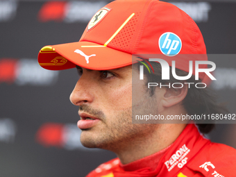 Carlos Sainz speaks to the press after driving in a sprint qualifying session at Circuit of the Americas in Austin, Texas, on October 18, 20...