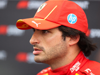 Carlos Sainz speaks to the press after driving in a sprint qualifying session at Circuit of the Americas in Austin, Texas, on October 18, 20...