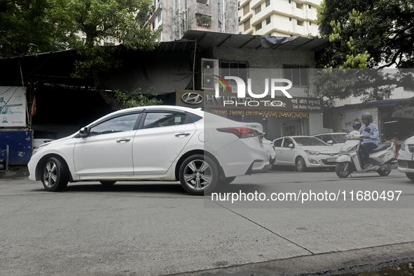 The signage of Hyundai Motor India Ltd. is seen in front of an authorized Hyundai vehicle workshop in Mumbai, India, on October 19, 2024. Th...