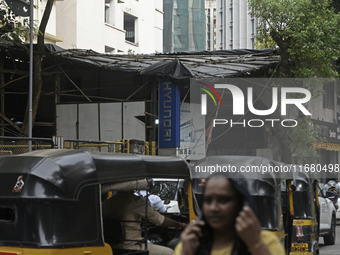 The signage of Hyundai Motor India Ltd. is seen in front of an authorized Hyundai vehicle workshop in Mumbai, India, on October 19, 2024. Th...