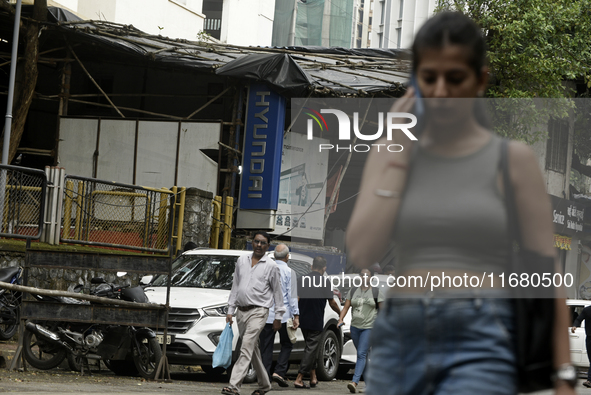 The signage of Hyundai Motor India Ltd. is seen in front of an authorized Hyundai vehicle workshop in Mumbai, India, on October 19, 2024. Th...