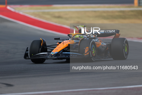 Lando Norris drives in a free practice session at Circuit of the Americas in Austin, United States, on October 18, 2024, during the Formula...